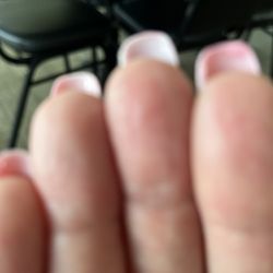HT Top Nails - Polish is all underneath the nails, and they were not filed down properly