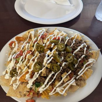 Emilio's Taqueria - Loaded Nachos - Tacos Near Me - Waller, Texas Emilio's Taqueria - Loaded Nachos - Tacos Near Me - Waller, Texas