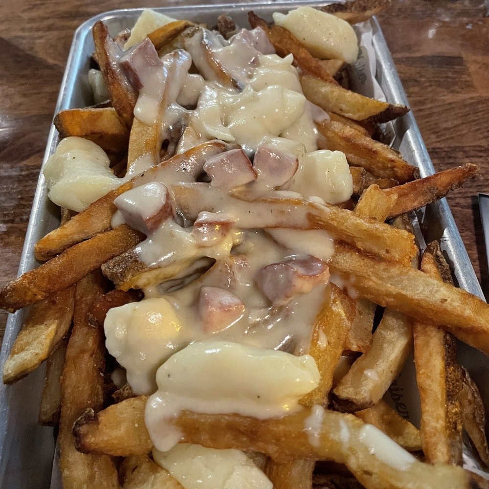 Kaiser Tiger - Douggie B's Poutine Rodeo - Hand cut fries topped with fresh cheese curds and southern white sausage gravy. - New American Near Me - Chicago, Illinois Kaiser Tiger - Douggie B's Poutine Rodeo - Hand cut fries topped with fresh cheese curds and southern white sausage gravy. - New American Near Me - Chicago, Illinois