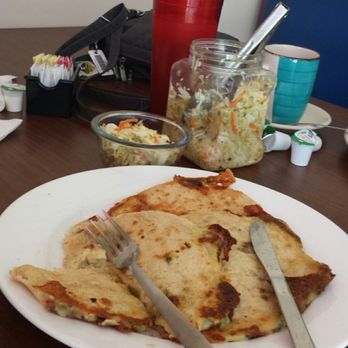 El Papaturro Restaurant - 3 pupusa and shredded cabbage, with tamarind drink in back with the coffee cup. - Salvadoran Near Me - Albuquerque, New Mexico El Papaturro Restaurant - 3 pupusa and shredded cabbage, with tamarind drink in back with the coffee cup. - Salvadoran Near Me - Albuquerque, New Mexico