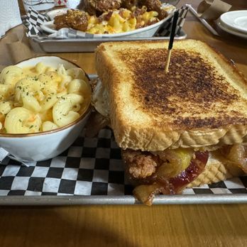 Gold Feather - GOOD MORNING AMERICA - texas toast | fried chicken l american cheese | bacon | hashbrown | fried egg | syrup | (sandwich) - Beer Bar Near Me - San Antonio, Texas