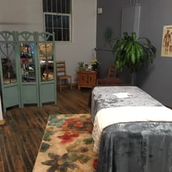 Restoration Massage - Beautifully designed space with a heated massage table.