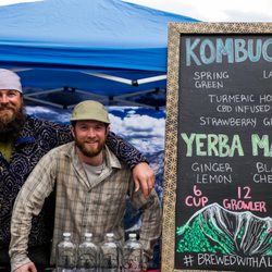 Elevated Elixirs - Hayden and Stove sharing kombucha and mate at the farmer's market.