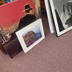 Arlington Attic - I am waiting on the price of this artwork. She will call and let me know.