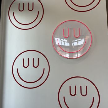 Natuur - a number of smiley faces on a wall - Juice Bars & Smoothies Near Me - Austin, Texas