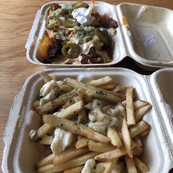 4 Hands Brewing - Food ordered separately--pork nachos and poutine fries - Breweries Near Me - Saint Louis, Missouri