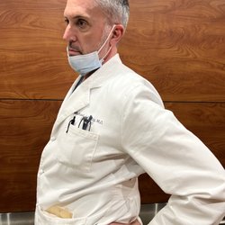 Hagg Michael J MD - Dr Hagg wearing his mask around his chin