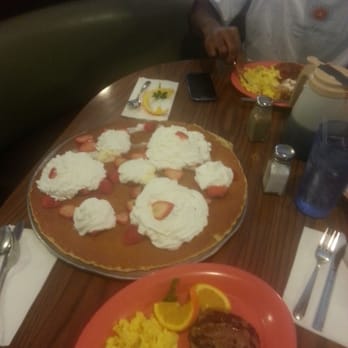 The Potholder Cafe - Yummmmm!! 18inch pancake with strawberry and wipe cream. Yummmmmm!!!!! - Breakfast & Brunch Near Me - Long Beach, California