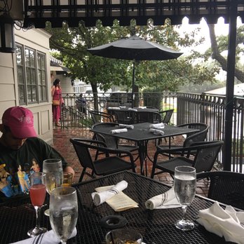 Backstreet Cafe - Although it's raining. They have covered outside seating available too - New American Near Me - Houston, Texas Backstreet Cafe - Although it's raining. They have covered outside seating available too - New American Near Me - Houston, Texas