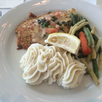 Macray Harbor - Whitefish with lemon caper sauce. Fish was okay...potatoes were amazing! - Boating Near Me - Harrison Township, Michigan