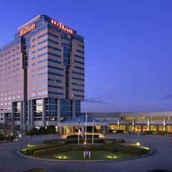 Divine Experiences Hair Salon - We are located in the lower lobby of the Atlanta Airport Hilton Hotel; shuttle bus runs to the airport every 15-20 mins.