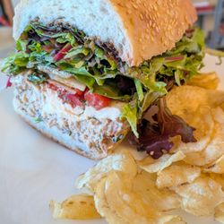 Dalfonso’s Italian Imports - Half of the cranberry chicken salad sandwich special. I added the chips.