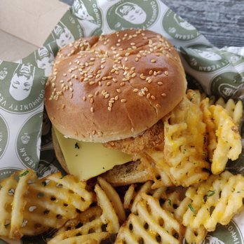 Community Kitchen + Taproom - Vegan fish filet sandwich. Comes with waffle fries, tartar sauce, and cabbage slaw. So good! - Vegan Near Me - Austin, Texas