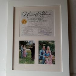Bauhaus Picture Framing - Multiple opening mat. White frame with cream mat looks very clean and appropriate for this wonderful wedding picture!