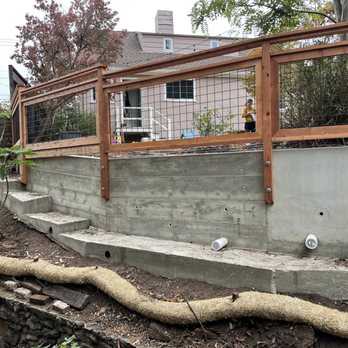 Solid Ground Masonry and Concrete - The new wall, drainage, and fence - Masonry/Concrete Near Me