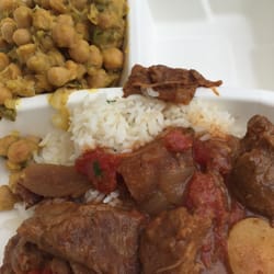 Lamb curry on a bed of rice with chick peas as a side :]