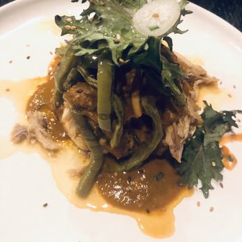 Mayan Cafe - Oven-roasted rabbit, pipian rojo, pim tortilla filled with beans & cheese and grilled cactus - Latin American Near Me - Louisville, Kentucky