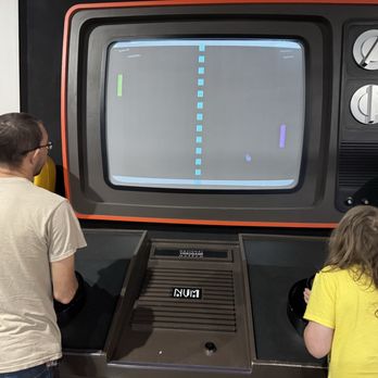 National Videogame Museum - A giant screen in which to play the video game Pong at the National Video Game Museum. - Museums Near Me - Frisco, Texas National Videogame Museum - A giant screen in which to play the video game Pong at the National Video Game Museum. - Museums Near Me - Frisco, Texas