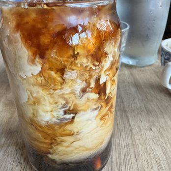 maman - Vanilla Cold Brew with the cream poured in live action! - Bakeries Near Me - Jersey City, New Jersey maman - Vanilla Cold Brew with the cream poured in live action! - Bakeries Near Me - Jersey City, New Jersey