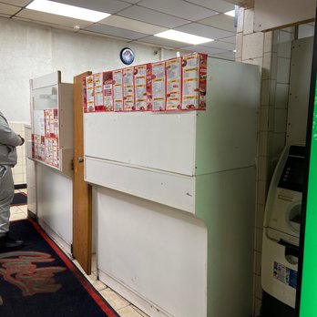 Chelsea Pizza - a man standing in front of a vending machine - Pizza Near Me - Atlantic City, New Jersey Chelsea Pizza - a man standing in front of a vending machine - Pizza Near Me - Atlantic City, New Jersey