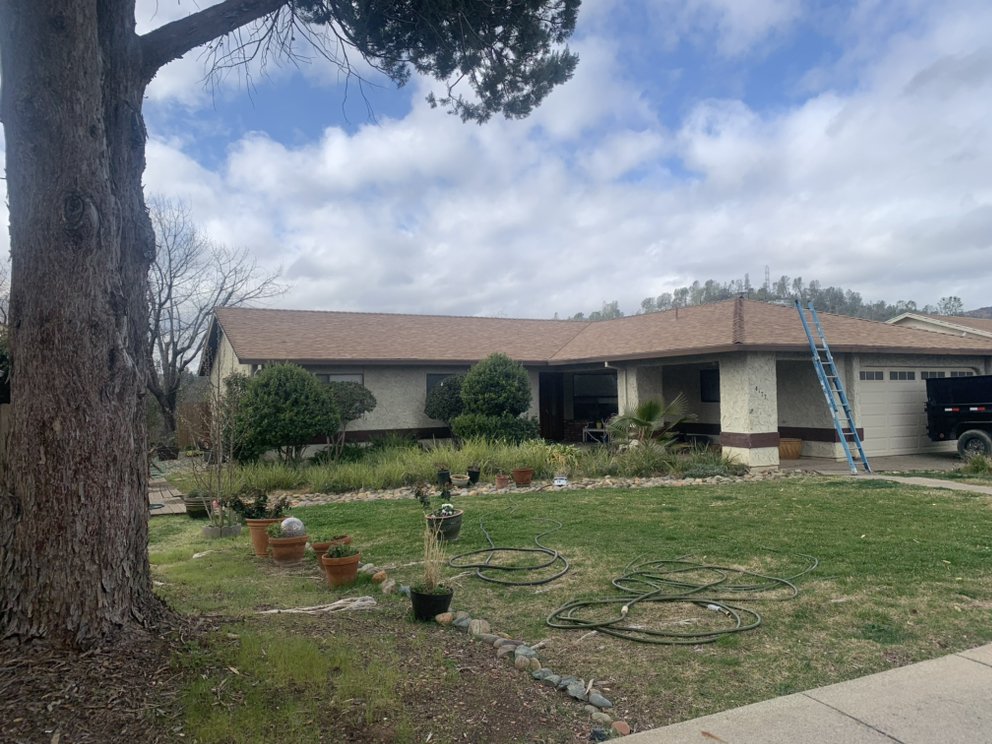 Slide of ZeZee Roofing