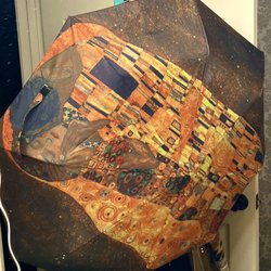 Shady Ladies Closet - Umbrella with Klimt's "The Kiss" was raining hard that day in Tombstone so nice to be able to grab this! I hate boring black umbrellas!