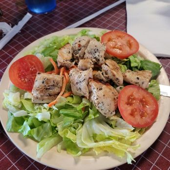 Pizza Palace - a plate of chicken salad with tomatoes and lettuce - Pizza Near Me - Columbia, South Carolina