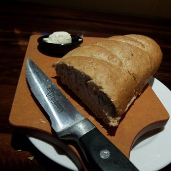 LongHorn Steakhouse - The bread comes with a super happy fun knife. - Steakhouses Near Me - Parsippany, New Jersey LongHorn Steakhouse - The bread comes with a super happy fun knife. - Steakhouses Near Me - Parsippany, New Jersey