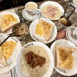 旺記冰室 - Breakfast Combos all served with a drink, buttered toast, and scrambled eggs - Instant Noodle with satay beef ; Macaroni with sliced ham