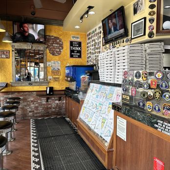New York Pizza Department - Window seating area next to ordering counter - Pizza Near Me - Corona, California New York Pizza Department - Window seating area next to ordering counter - Pizza Near Me - Corona, California