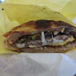 Sausage, egg and cheese on a croissant, with pickled jalapeno slices. AMAZING! 11 out of 10.