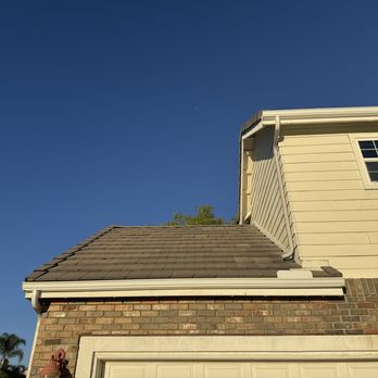 Rio Rico Seamless Rain Gutters - Downspout from second floor to first, just above the garage. - Gutter Services Near Me Rio Rico Seamless Rain Gutters - Downspout from second floor to first, just above the garage. - Gutter Services Near Me