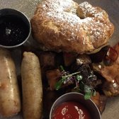 Foto de Garden Social Beer Garden & Kitchen - East Meadow, NY, Estados Unidos. Stuffed Croissant French Toast with sausage and bacon