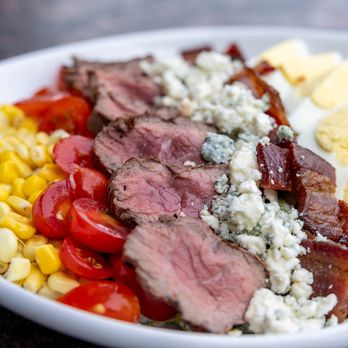 Redstone American Grill - Filet Mignon Cobb Salad | bacon, egg, blue cheese crumble, corn, tomato, smoked onion ranch - Steakhouses Near Me - Burlington, Massachusetts Redstone American Grill - Filet Mignon Cobb Salad | bacon, egg, blue cheese crumble, corn, tomato, smoked onion ranch - Steakhouses Near Me - Burlington, Massachusetts