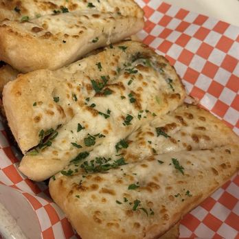 Buca di Beppo Italian Restaurant - Mozzarella cheese garlic bread - Italian Near Me - Universal City, California Buca di Beppo Italian Restaurant - Mozzarella cheese garlic bread - Italian Near Me - Universal City, California