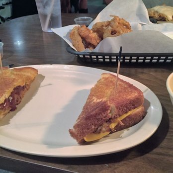 Cast Iron Grill - Pulled pork grilled cheese and onion rings - Breakfast & Brunch Near Me - Lubbock, Texas
