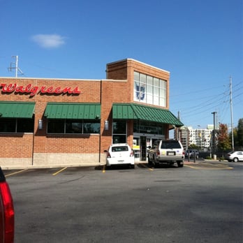 Walgreens - the front of a store with cars parked in front of it - Drugstores Near Me - Atlanta, Georgia