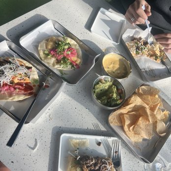 The Dream Tacos - Guac and queso, beef Wellington taco, catfish taco and Peppered Ahi taco.  Yum! - Desserts Near Me - Lewisville, Texas