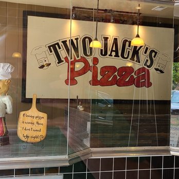 Two Jacks Pizza - Fun dining area  with cool decor and outside view - Pizza Near Me - Provo, Utah