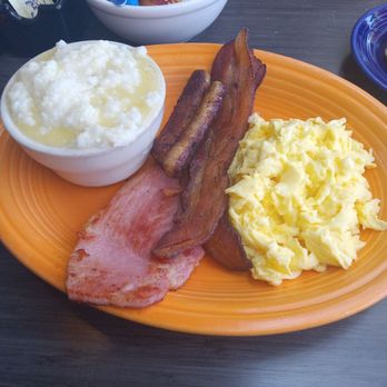 The Clique Restaurant - Big clique including grits with added butter - New American Near Me - Detroit, Michigan The Clique Restaurant - Big clique including grits with added butter - New American Near Me - Detroit, Michigan