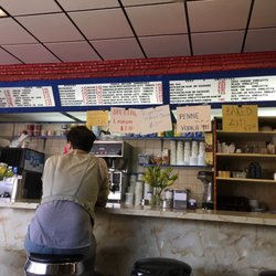 Lulu's Luncheonette - Photo of the counter and the posted menu