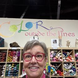 For Yarn's Sake - Irocknits in front of the "color" sign