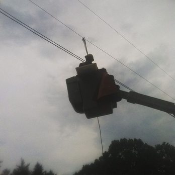 Parrish Tree Service - Bucket work near power line - Tree Services Near Me Parrish Tree Service - Bucket work near power line - Tree Services Near Me