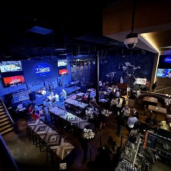 Sidecar Social - a band playing on stage - Sports Bars Near Me - Addison, Texas Sidecar Social - a band playing on stage - Sports Bars Near Me - Addison, Texas