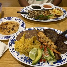 Carne Asada plate with Loroco and Cheese Pupusa and Pork and Cheese Pupusa. El Chevere Carne Asada and Shrimps and Pork and Cheese Pupusa. Carne Asada plate with Loroco and Cheese Pupusa and Pork and Cheese Pupusa. El Chevere Carne Asada and Shrimps and Pork and Cheese Pupusa.