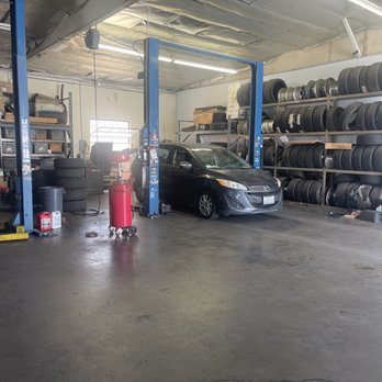At Auto Repair - Car in the process of getting oil change - Auto Repair Near Me - South El Monte, California At Auto Repair - Car in the process of getting oil change - Auto Repair Near Me - South El Monte, California