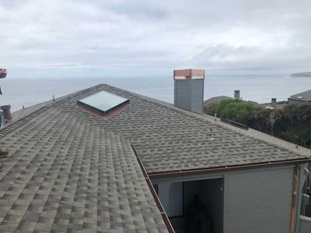 Slide of Henris Roofing