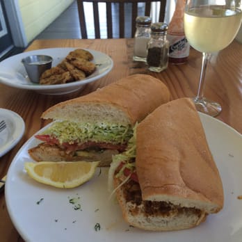 The Parish Cafe - Louisiana bbq shrimp po' boy and some fried green tomatoes. So good!! Bread is perfect. - Cajun/Creole Near Me - Healdsburg, California