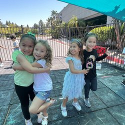 Our daughter and her friends at Cola.