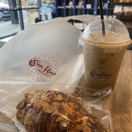 Almond croissant & iced caramel macchiato with oat milk